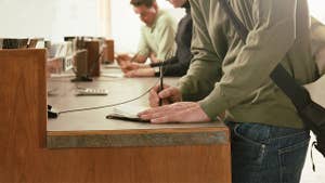 Person filling out money order