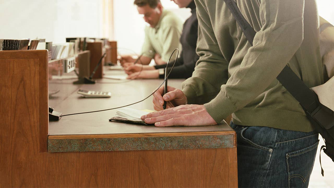 Person filling out money order