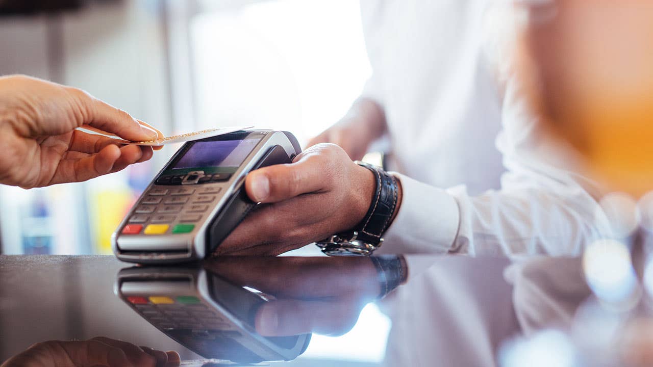 Man paying with credit card