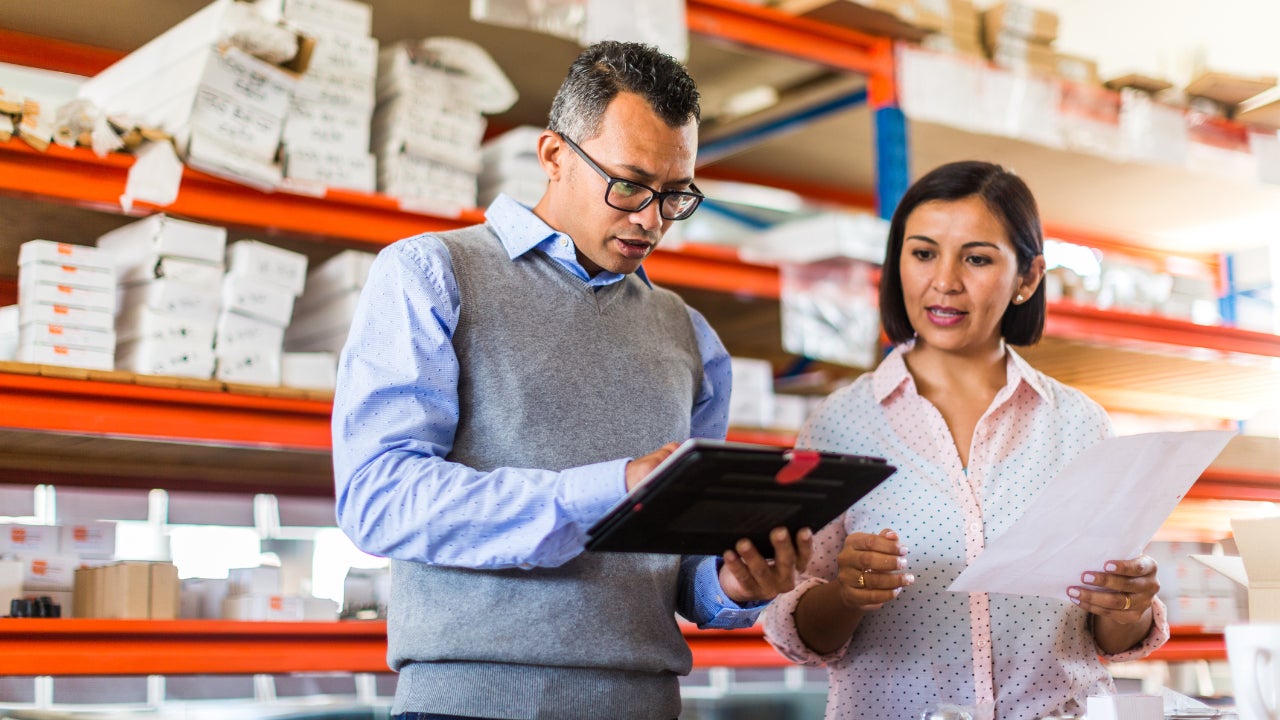 Two managers talking in a small business