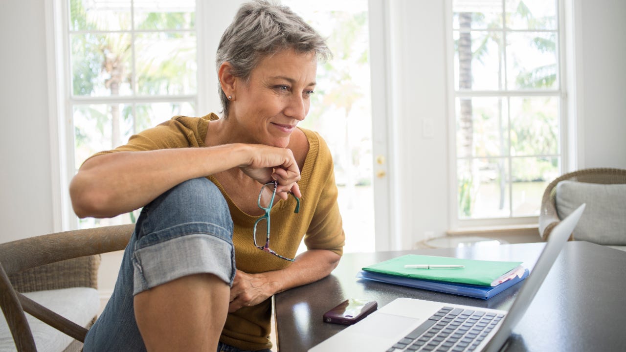 Person looking at their laptop