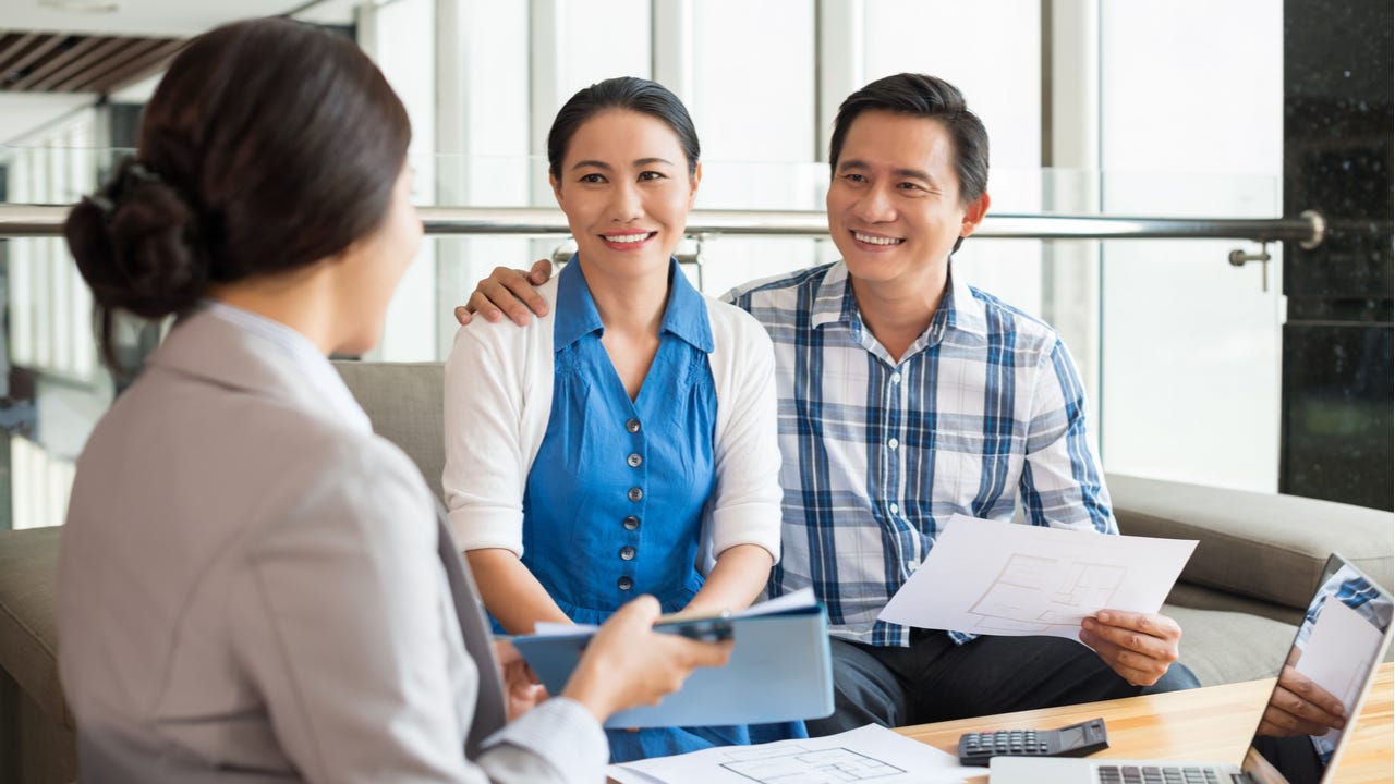 Couple meets with a financial advisor