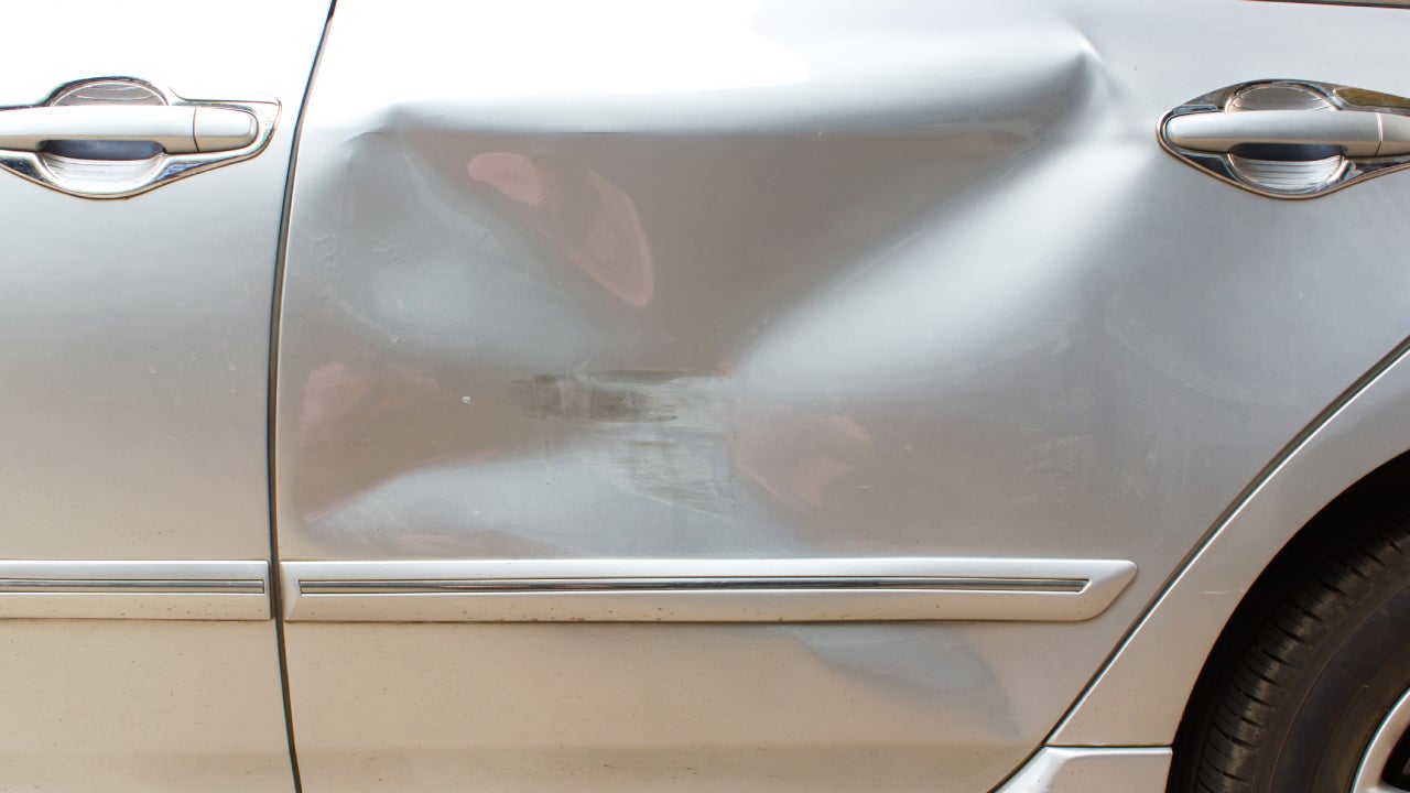 Car crash on back door, passenger seat. Accident of transportation background.
