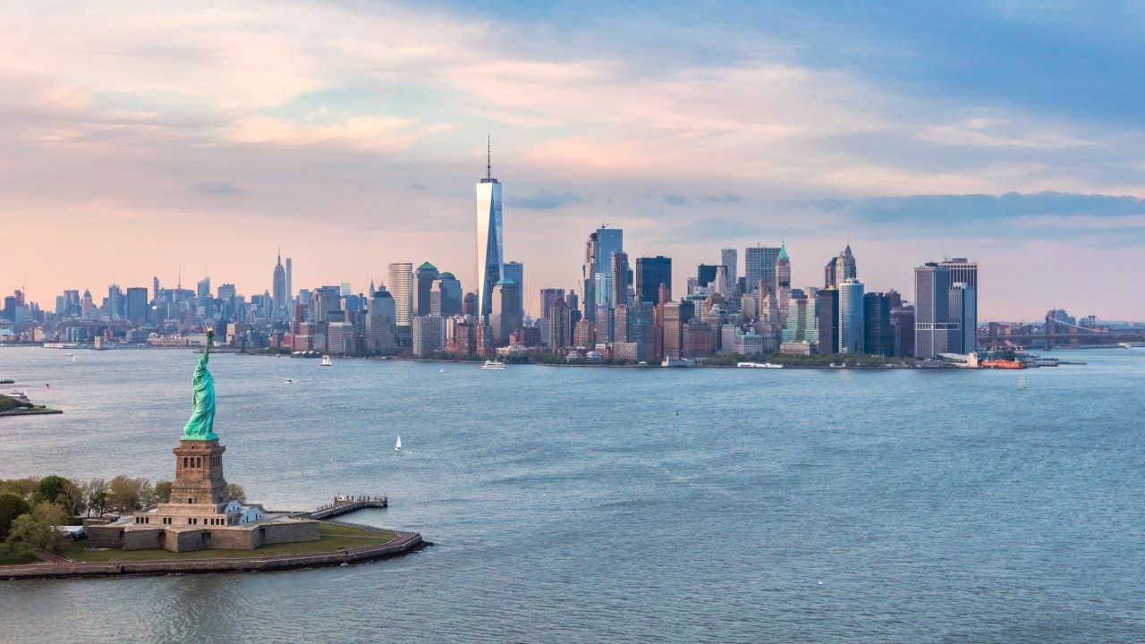 A view of NYC with the statue of liberty