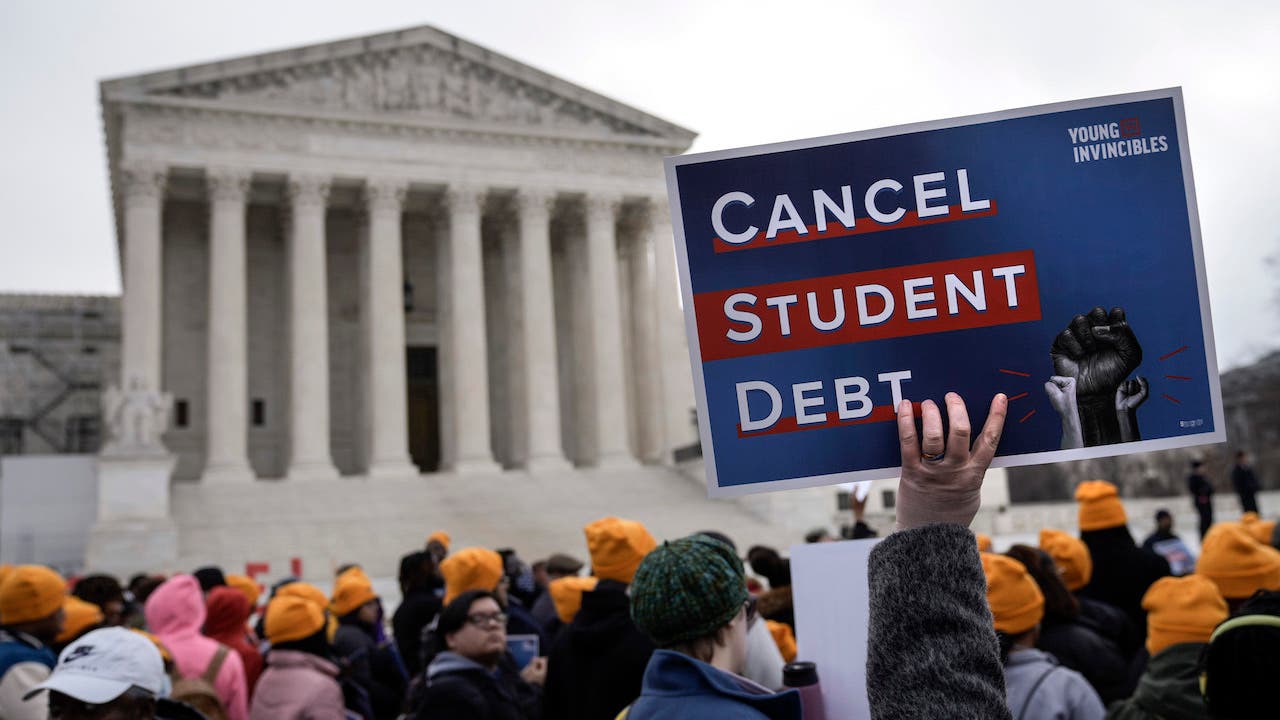 WASHINGTON, DC &#8211; FEBRUARY 28: People rally in support of the Biden administration&#8217;s student debt relief plan in front of the the U.S. Supreme Court on February 28, 2023 in Washington, DC. This morning, the U.S. Supreme Court will hear oral arguments in two cases challenging President Joe Bidens student loan debt forgiveness program, which remains on hold after a lower court blocked the plan in November. The two cases Biden v. Nebraska and Department of Education v. Brown, which could decide the fate of the program that aims to forgive an estimated $400 billion in student debt for 26 million borrowers. (Photo by Drew Angerer/Getty Images)