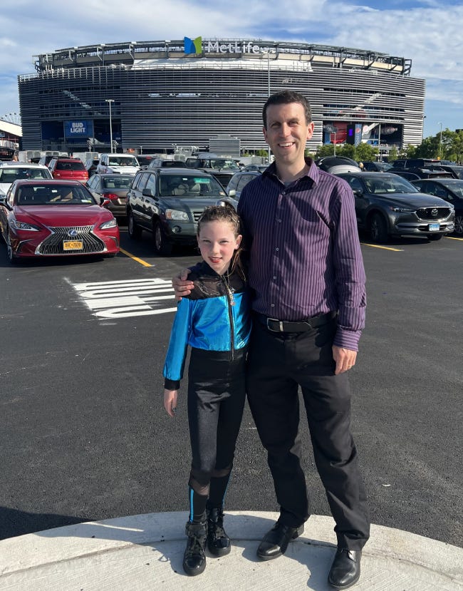 Ted Rossman and daughter attending a Taylor Swift concert.