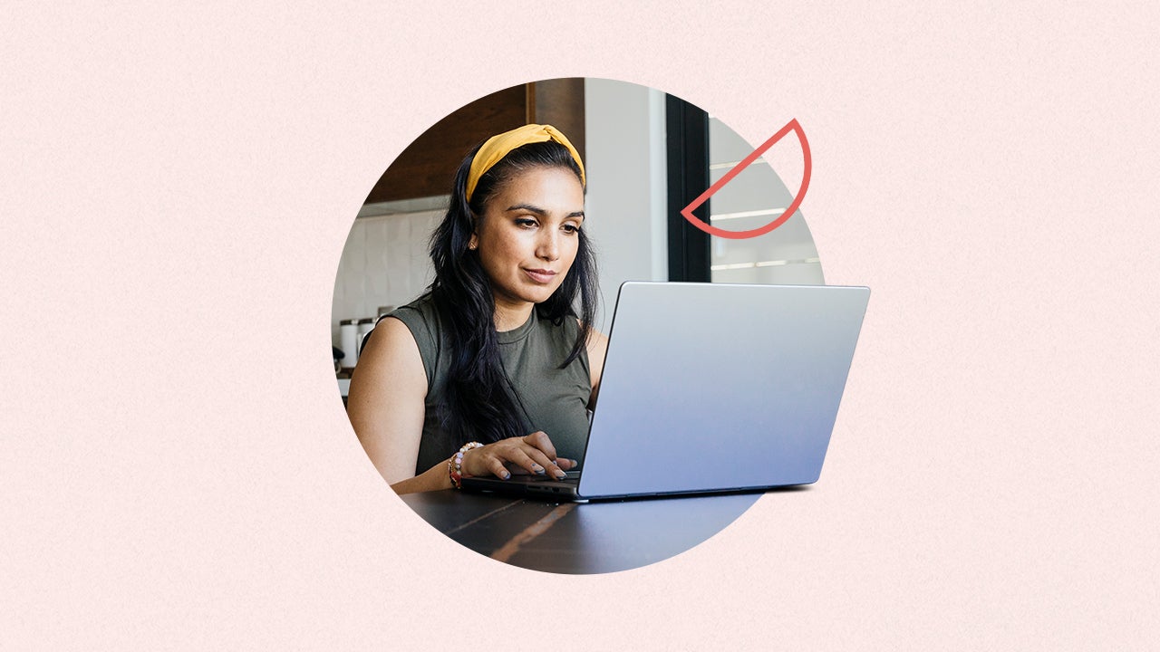 Woman working on laptop. The image is placed in a centered circle on a light pink background. There is a transparent red semicircle on the right side of the image.