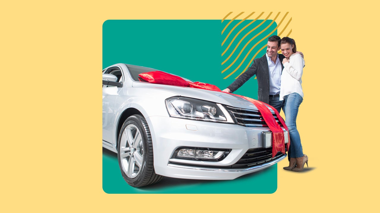 Image of a sedan with a large red ribbon. A couple stands beside it while hugging each other. Image is overlaid on a green square with a yellow background.