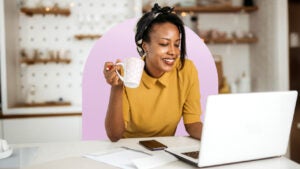 Small business owner looking at computer