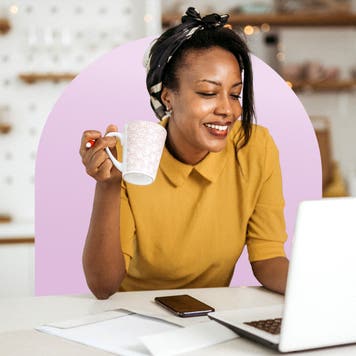 Small business owner looking at computer