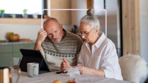 Old people looking at information