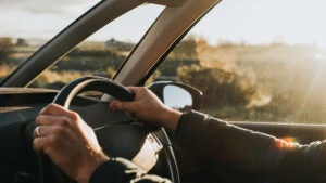 Hands on steering wheel