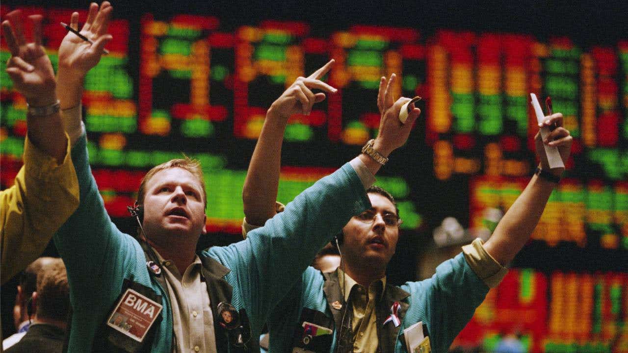 People on a stock trading floor.