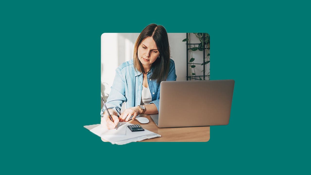 A woman reviewing papers next to her laptop with an illustrated green background