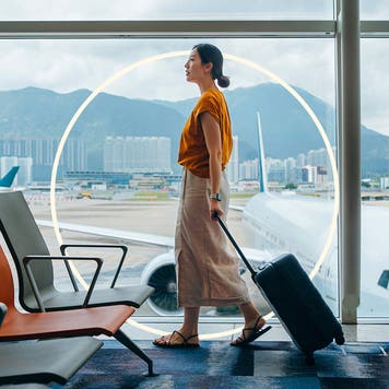Illustration of woman walking through airport