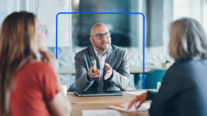 A financial advisor consults with two family members.