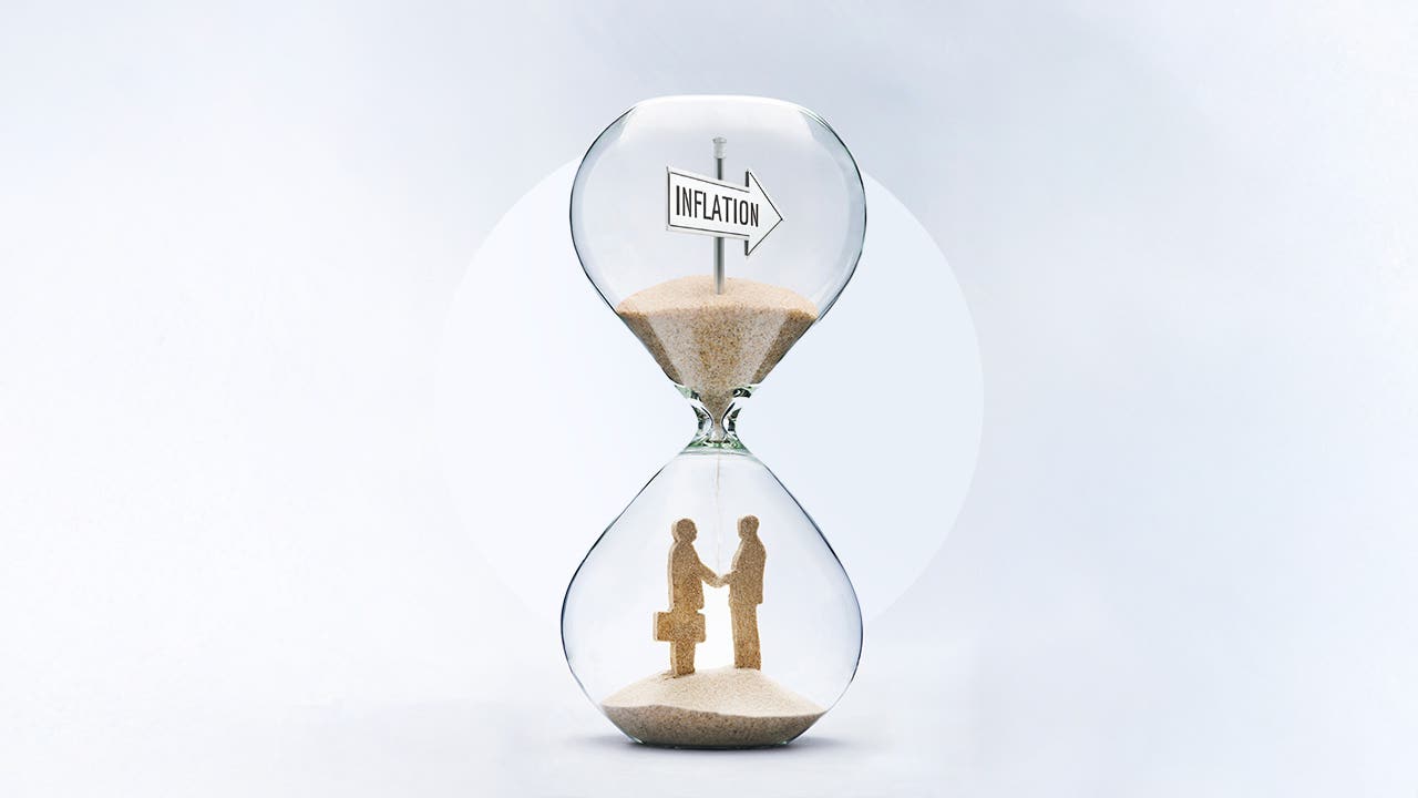 Sand goes through a time with inflation on the top and couple on the bottom
