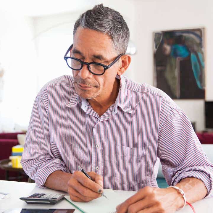 Mature man doing working at home