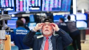 A trader works at the New York Stock Exchange in New York