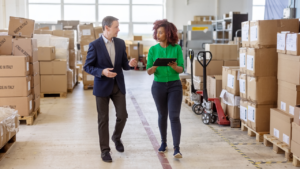 A business owner and her partner discuss business strategy.
