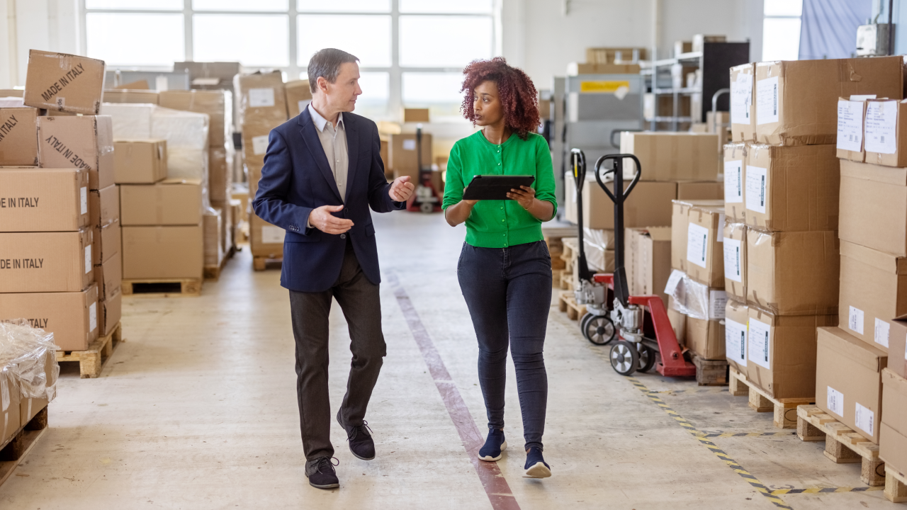 A business owner and her partner discuss business strategy.