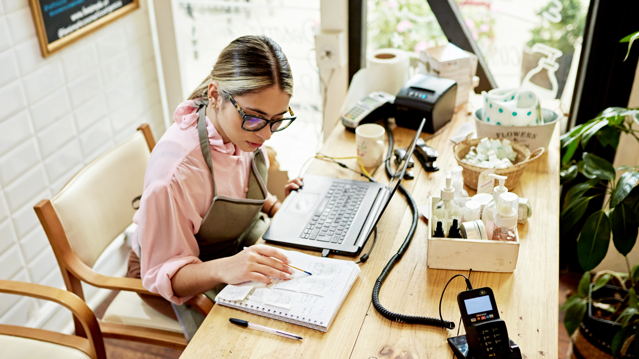 A business owner examining loan paperwork