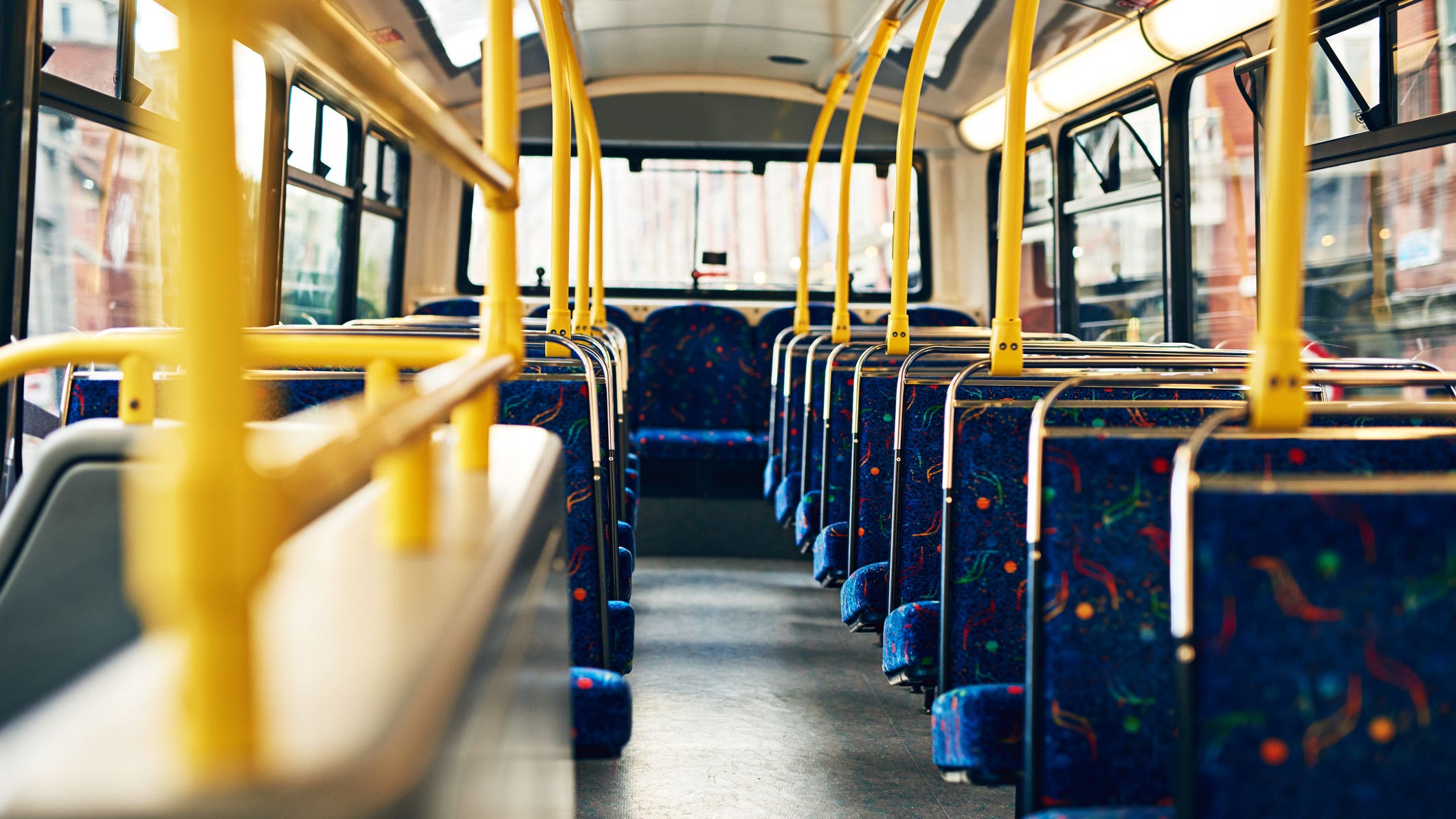 Cropped shot of empty seats on a public bus
