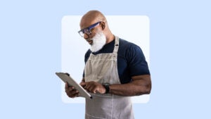Owner of small business against blue background