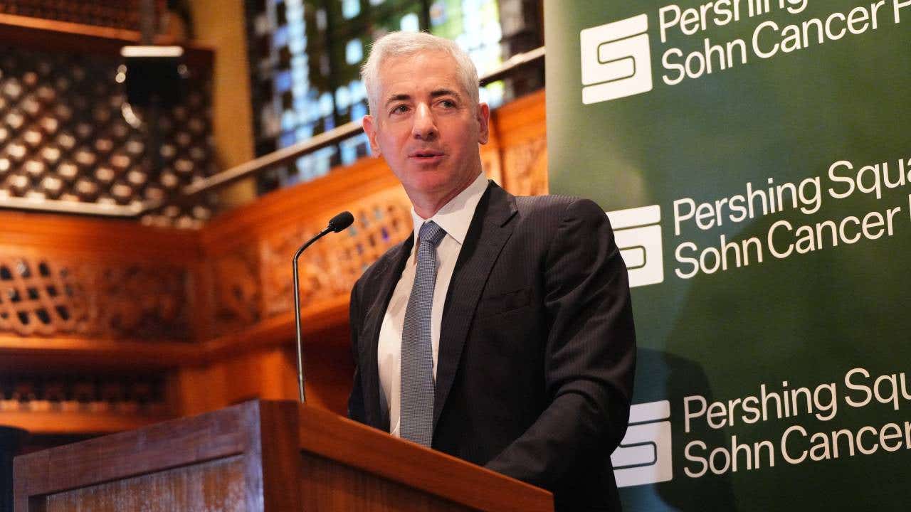 Bill Ackman speaking from behind a podium.