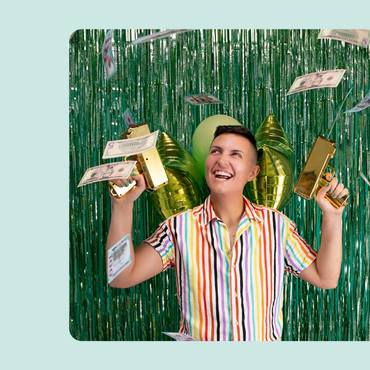 business owner celebrating with money in the air