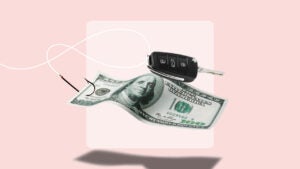 A hundred dollar bill and a set of car keys being hooked by a fishing line