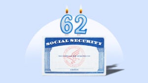 Birthday candles stick out of a Social Security card.