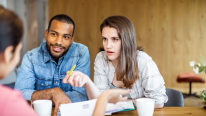 Young couple planning their finances together.