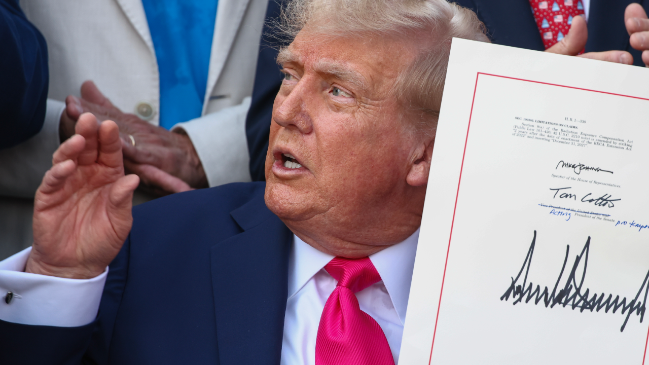 President Donald Trump, joined by Republican lawmakers, signs the One, Big Beautiful Bill Act into law during an Independence Day military family picnic on the South Lawn of the White House on July 04, 2025 in Washington, DC.