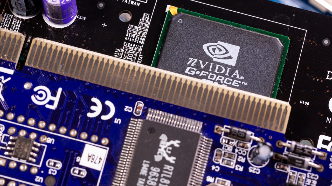 NVIDIA GeForce chip is seen on a printed circuit board PCB.