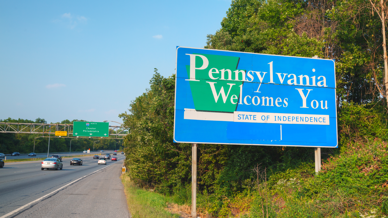 Pennsylvania Welcomes You road sign at the state border.