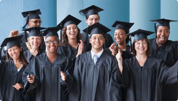 Four college students in black and red caps and gowns